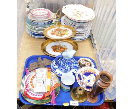 A quantity of ceramic decorative ribbon wall plates, together with a blue and white cream jug with saucers, a copper Art Nouv