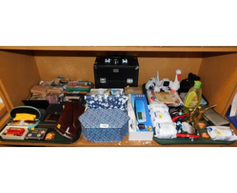 A quantity of household goods, including gloves, water filters, travelling make up case, security camera set, soft toys, toge