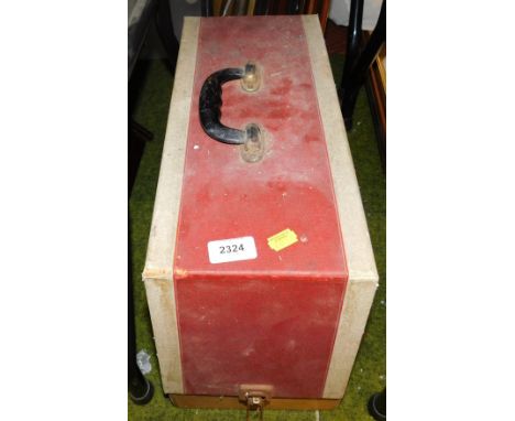 A cased manual Singer sewing machine. 