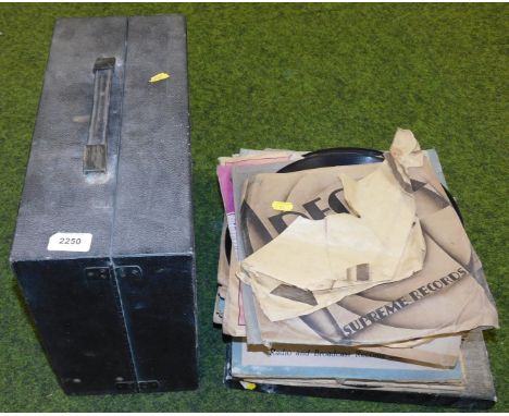 A early 20thC Columbus wind up record player, complete with a selection of period recordings.