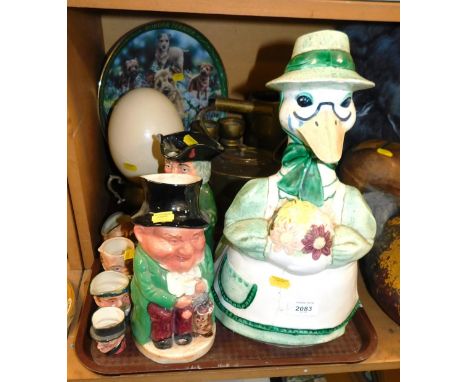 A collection of Burlington character jugs, together with an ostrich egg, a brass Victorian kettle, pair of brass candlesticks