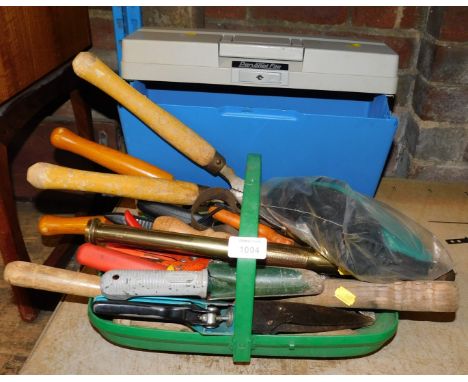 A quantity of gardening tools, including shears, dibber, trowels, etc., contained within a green garden basket, and a Twin Lo
