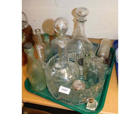 A quantity of glassware, including an engraved decanter, ship in a bottle, plain wine decanter, moulded glass trifle bowl, an