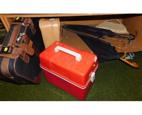 A pair of compact fabric travel cases, a quantity of cane handled umbrellas and a cane bag, together with a travel cool box.
