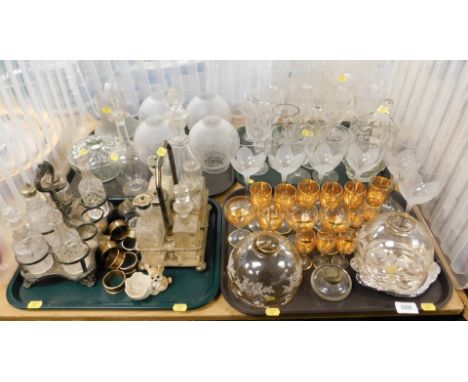 A quantity of mixed glassware, including wine glasses, beer glasses, water jug and a mixed collection of lamp shades, a plate