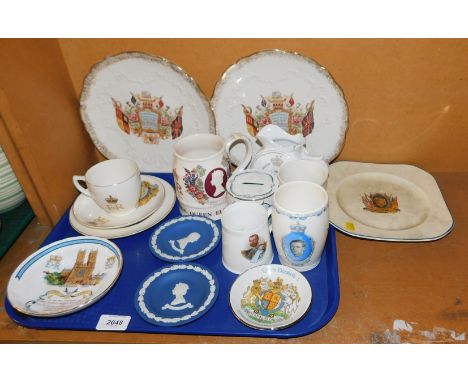 A quantity Royal commemorative ceramic ware, including pin dishes, a trio celebrating Queen Elizabeth II, a beer mug, togethe