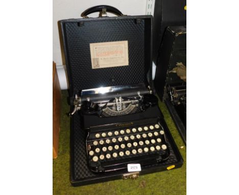 A Corona manual typewriter, cased.