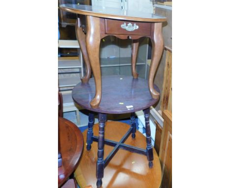 A collection of occasional tables, an elliptical coffee table with teak finish, a circular card table, with a laminate rosewo