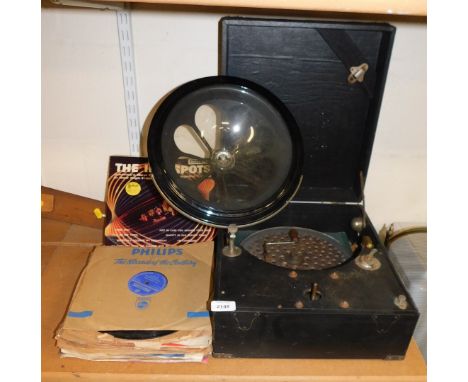 A Phonos wind up record player, (AF), together with a collection of 10" LP records including The Ink Spots, and Frankie Vaugh