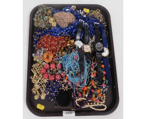 A quantity of costume jewellery, including a collection of manual and quartz wrist watches. (1 tray)