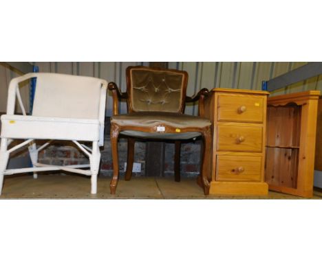 A pine three drawer bed unit, a pine open corner unit, a hardwood framed occasional chair, upholstered, together with a Lloyd