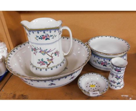 An Adderley Isis pattern toilet set, comprising wash bowl and wash jug, soap dish, toothbrush holder, and bed pan.