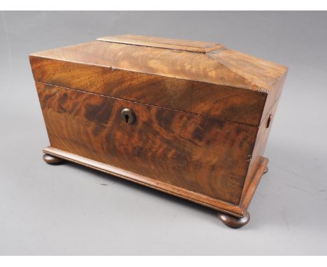 A mahogany sarcophagus tea caddy, on bun feet with associated mixing bowl, 12 1/2" wide 