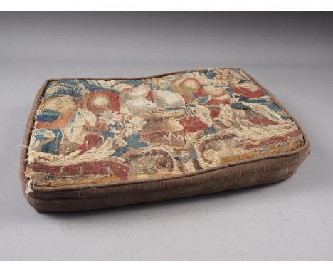 A fragment of 17th century verdure tapestry, made into a kneeler, 15" wide 