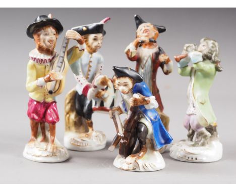Five Continental porcelain monkey musician figures, the tallest 4 1/2" high (some damages and paint loss) 