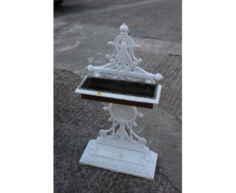 A Victorian white painted cast iron umbrella/stick stand with copper planter, 33" high 