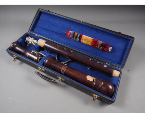 A bass recorder, in case 