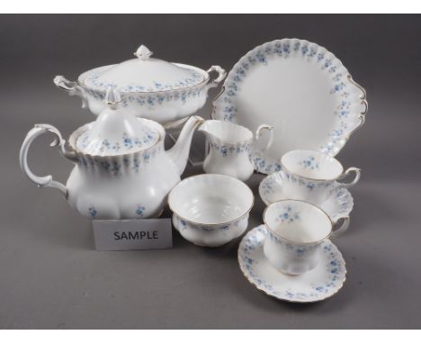A Royal Albert "Memory Lane" combination service for six, including tureens, tea and coffee pots, cups and saucers, a meat pl