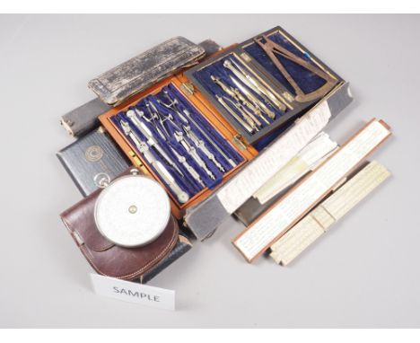 An Otis King's Patent calculator, in leather case, various rules and other scientific instruments 