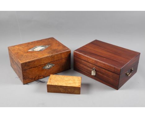 A 19th century mahogany writing box with part fitted interior, 12" wide, a burr walnut and mother-of-pearl inlaid workbox (no