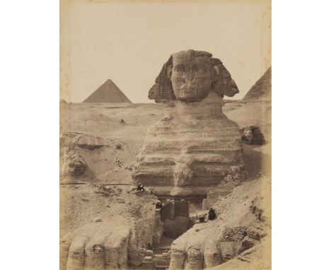 Late 19th century albumen photograph print depicting a partially excavated Great Sphinx of Giza with pyramids in the backgrou