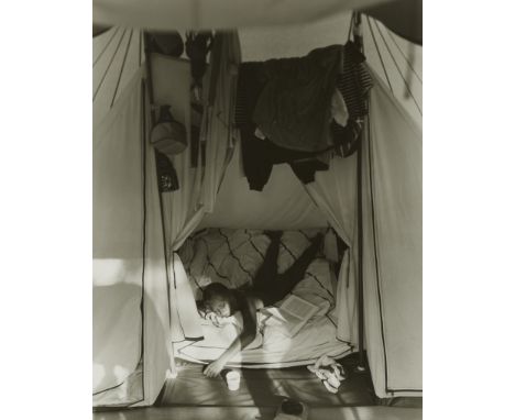 John "Jock" Sturges (American, b. 1947). Gelatin silver print photograph of a young girl resting in a tent.Sight; height: 18 