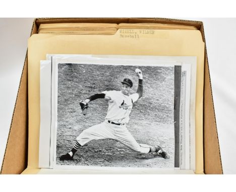 One box containing gelatin silver print or original vintage press photographic reproduction from the archives of the Star Tri