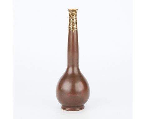 Christofle, France. Art Deco patinated and gilt bronze dinanderie vase, early 20th century. The vase is of a bottle form, fea