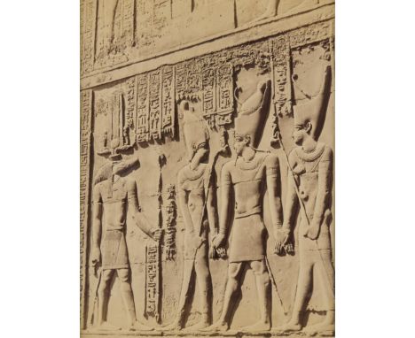 Late 19th century albumen photograph print depicting bas relief hieroglyphics in the Temple of Kom Ombo. The scene depicts a 