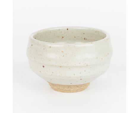 Warren MacKenzie (American, 1924-2018). A small studio pottery ceramic chawan tea bowl or cup. Stoneware with a shino glaze. 