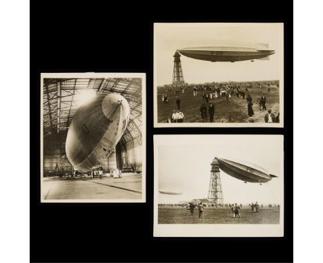 Group of three original gelatin silver print photographs depicting airships or dirigibles ca. 1920s-1930s. All published by U