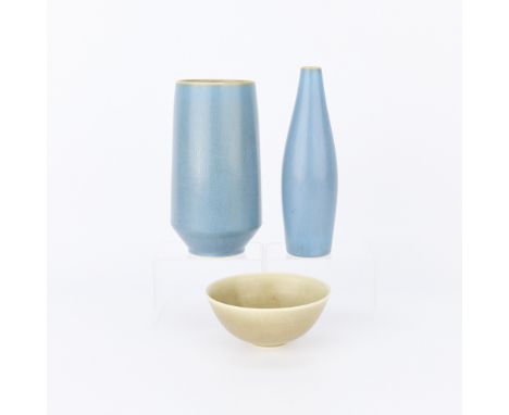 Palshus, Denmark. Group of three mid-century modern ceramic vessels including an elegantly shaped bottle vase of a pale blue 