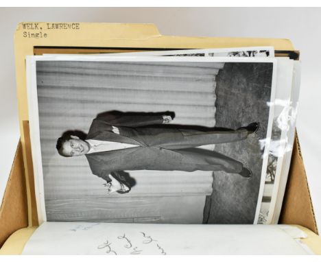 One box containing gelatin silver print or original vintage press photographic reproduction from the archives of the Star Tri