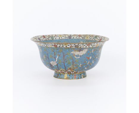 Large Chinese Ming style cloisonne bowl. Beautifully decorated along the interior with white geese and flowers; along the ext
