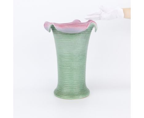 Weller Pottery, Fultonham, Ohio, USA. Tall ceramic Fleron vase glazed matte green along the exterior and pink along the inter