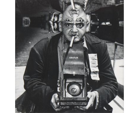 Arthur Fellig "Weegee" (American, 1899-1968). Ferrotyped silver print photograph titled "Distortion (Self-Portrait with Camer