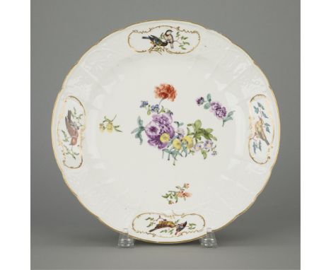 Meissen Porcelain, Germany. Hand-painted porcelain charger plate depicting flora and fauna, ca. 1750. With stems, vines, and 