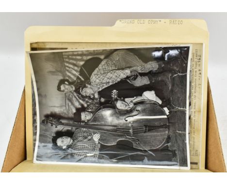 One box containing gelatin silver print or original vintage press photographic reproduction from the archives of the Star Tri