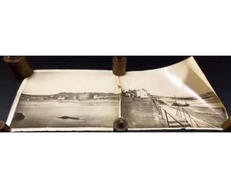 Two Gibson & Sons Penzance and Scilly Isles black and white photographs of Penzance Promenade. 