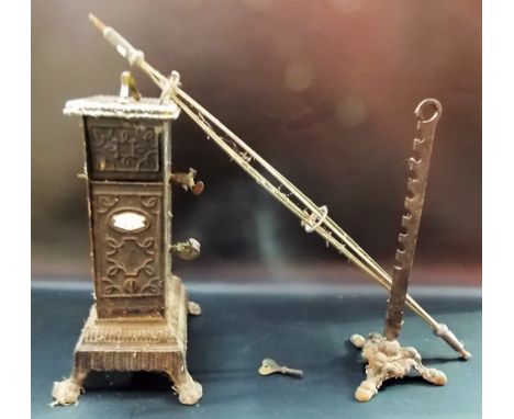 19th Century French cast iron spit jack with white enamel tablet 'qualite superieure'.