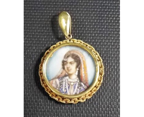 Indian high purity gold ivory miniature pendant, painted with a portrait of a lady, weight 4.3g approx