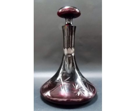 Ruby overlay cut glass ships decanter and stopper.