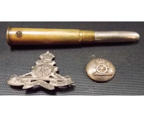 WWI silver Royal Artillery badge, Birmingham 1916; together with a silver Royal Artillery button and a WWI bullet Stanhope sh