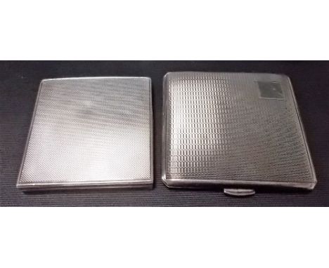 Silver engine turned cigarette case, Birmingham 1960; together with a silver engine turned compact, weight 5.25oz approx (2).