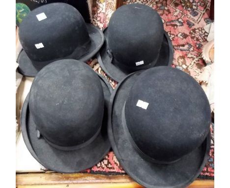 Four vintage bowler hats, two by Bates Hatter 21 Jermyn Street, St. James, London.