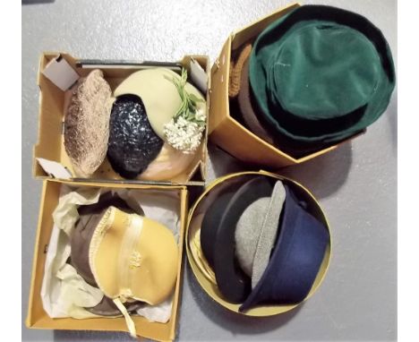 Four boxes of vintage ladies hats 