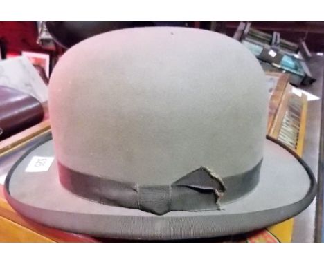 Vintage brown bowler hat.