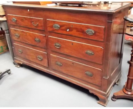 George III mahogany mule chest, the hinged top over an arrangement of two dummy drawers and four drawers flanked by fluted pi