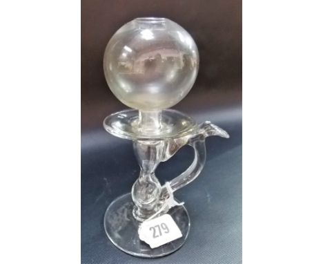 18th Century glass lace makers oil lamp with baluster hollow stem, the handle with thumb piece and upon circular foot, height