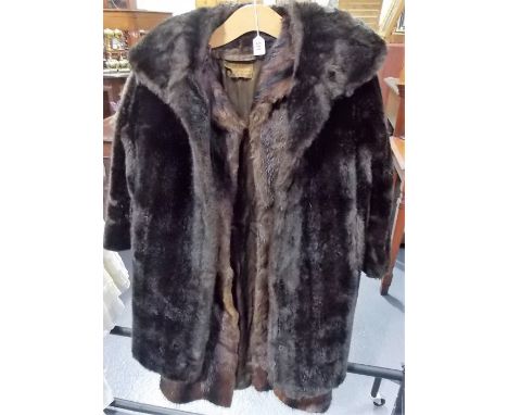 Vintage ladies three quarter length fur coat by Griffin & Spalding, together with a faux fur coat (2).